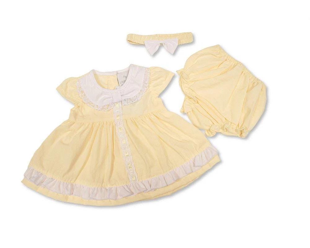 Lemon yellow smock lace and and bow