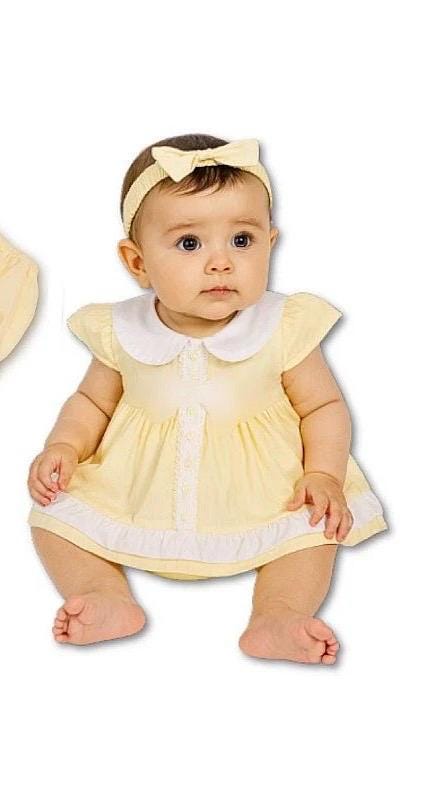 Lemon yellow smock lace and and bow